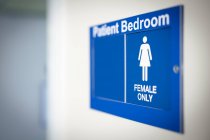 Female only single sex ward blue sign. — Stock Photo