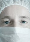 Close-up of female doctor in surgical mask. — Stock Photo