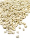 Close-up view of pearl barley on white background. — Stock Photo