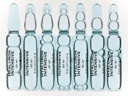 Ampollas de vidrio de ácido hialurónico . - foto de stock