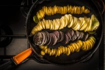 Slices of carrots in frying pan. — Stock Photo