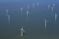 Wind turbines of windfarm in North Sea, England. — Stock Photo