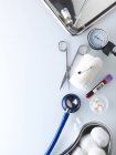 Assortment of medical equipment and consumables on table. — Stock Photo
