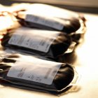 Blood bags labelled with bar codes, close-up. — Stock Photo