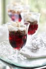 Glasses of raspberry trifle on table. — Stock Photo
