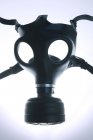 Black gas mask on white background. — Stock Photo
