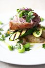 Healthy meal of organic lamb chump with courgette, potatoes and broad bean salad. — Stock Photo