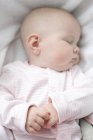 Infant baby sleeping in bed. — Stock Photo