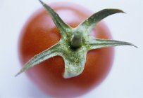 Close-up view of tomato on white background. — Stock Photo