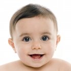 Portrait de bébé garçon souriant . — Photo de stock