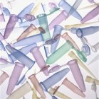 Assorted disposable plastic pipette tips and sample tubes. — Stock Photo