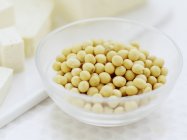 Soya beans in glass bowl. — Stock Photo