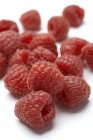 Close-up view of raspberries on white. — Stock Photo