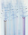 Group of laboratory test tubes with colored liquids. — Stock Photo