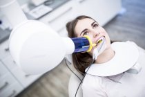 Young woman having dental x-ray — Stock Photo