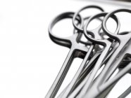 Close-up view of surgical forceps on white background. — Stock Photo
