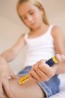 Diabetic teenage girl making injection with hormone insulin. — Stock Photo