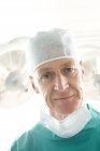 Portrait of male surgeon in operating theater. — Stock Photo