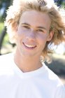 Portrait of young man with blond hair — Stock Photo