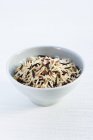 Brown basmati rice in ceramic bowl — Stock Photo