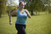 Young woman running — Stock Photo