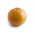 Rosa Grapefruit auf weißem Hintergrund. — Stockfoto
