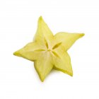 Metà delle starfruit su sfondo bianco . — Foto stock