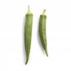 Close-up view of okra on white background. — Stock Photo