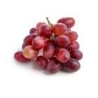 Red grapes on white background. — Stock Photo