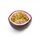 Half of passionfruit on white background. — Stock Photo