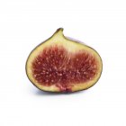 Half of fig on white background. — Stock Photo