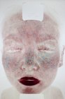 Обличчя жінки, що проходить огляд у клініці шкіри . — стокове фото