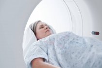 Mature woman in MRI scanner. — Stock Photo