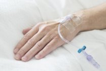 Close-up view of patient hand with cannula. — Stock Photo