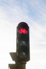 Cycling traffic light against cloudy sky. — Stock Photo