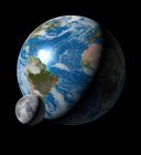 Digital artwork comparing size of Earth and Moon. — Stock Photo
