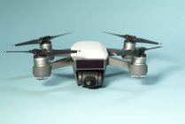 Quadcopter multirotor helicopter drone on plain background. — Stock Photo