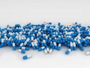 Montón de cápsulas de medicamentos azules, ilustración digital . - foto de stock