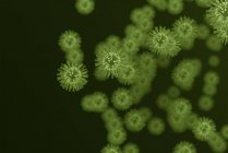 Illustration numérique de particules de virus vert sur fond plat
. — Photo de stock