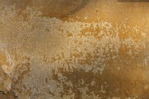 Brown weathered wall texture of building. — Stock Photo