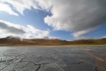 Cracked dried mud landscape in arid nature of Iceland. — Stock Photo