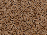 Ilustración 3D de textura de espuma de café con burbujas, primer plano
. - foto de stock