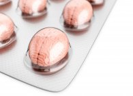 Primo piano dell'illustrazione 3D di pillole simili al cervello in blister . — Foto stock