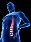 Vista de ángulo bajo 3d renderizado ilustración de silueta azul del hombre con dolor de espalda . - foto de stock
