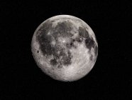 Digital illustration of Moon on black background. — Stock Photo