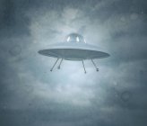 Vintage UFO saucer in cloudy sky, illustration. — Stock Photo