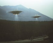 UFOs flying over highway and forest trees, illustration. — Stock Photo