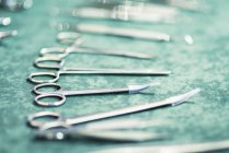 Close-up of dental instruments arranged on table in office. — Stock Photo