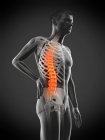 Seitenansicht des männlichen Körpers mit Rückenschmerzen auf schwarzem Hintergrund, konzeptionelle Illustration. — Stockfoto