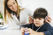 Boy having a hearing test in an audiologist's office. — Stock Photo